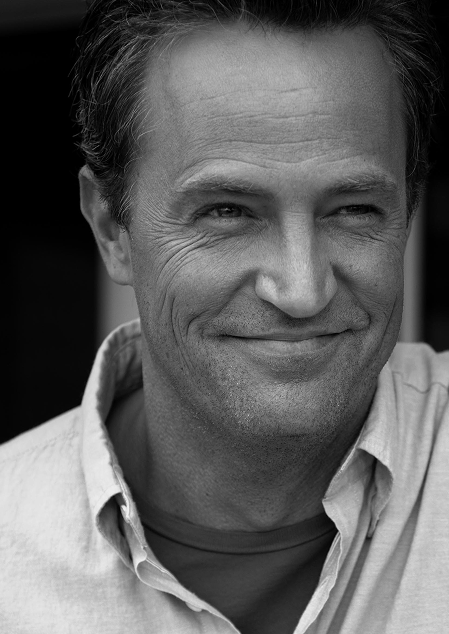 Black and white photo of Matthew Perry.